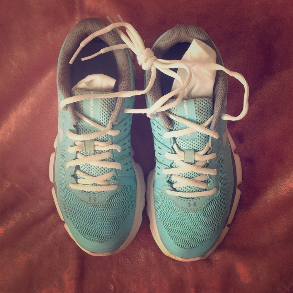 Light blue under armour micro G running shoes